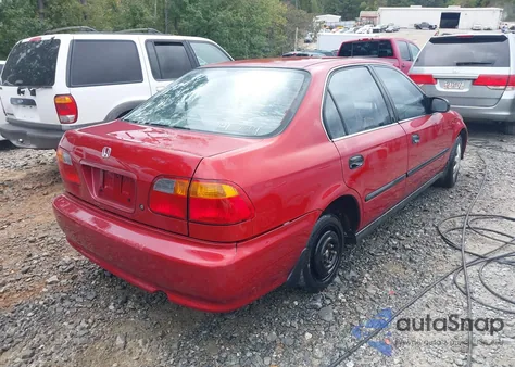 1999 Honda Civic Lx z USA, uszkodzony, nr VIN 1HGEJ6672XL049320